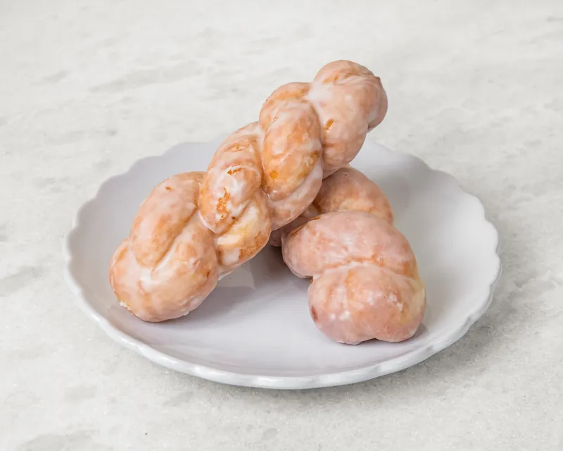 Two glazed twist donuts
