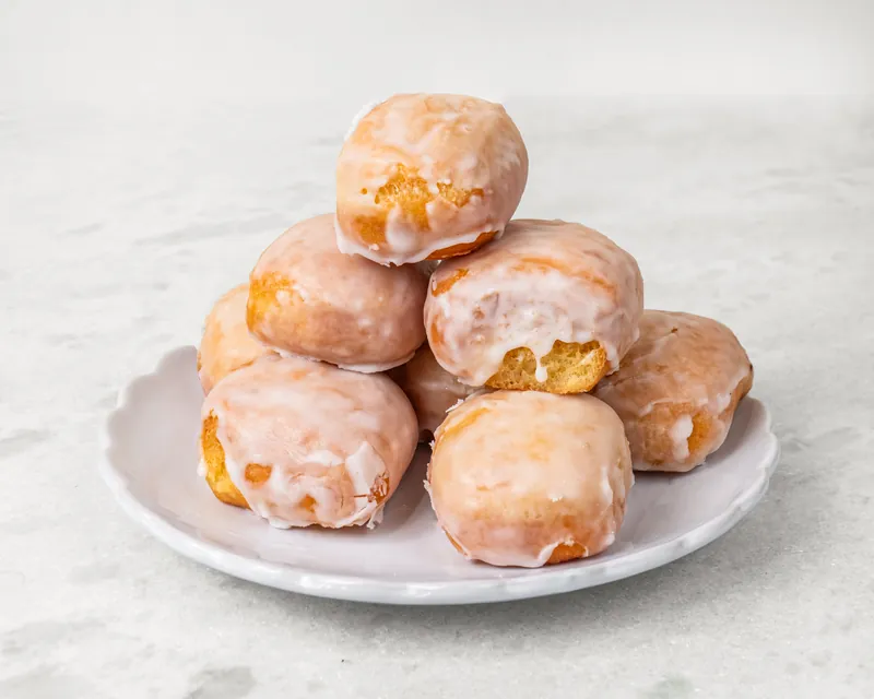 Stack of glazed party donut minis
