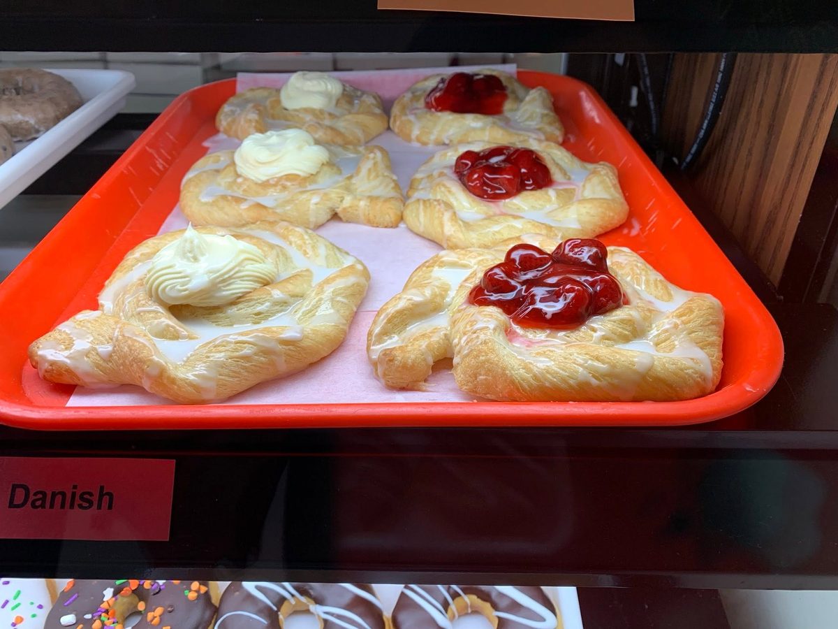 Cream cheese and cherry Danishes on a bakery tray
